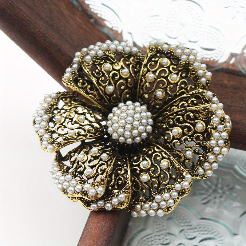 Retro Rhinestone Flower Brooch with Pearl Embellishments and Filigree Cut-Out Design