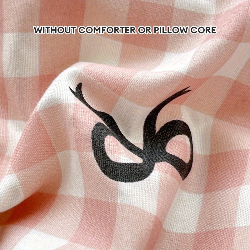 Conjunto de funda nórdica a cuadros rosa con patrón de lazo de 4 piezas de poliéster para todas las estaciones