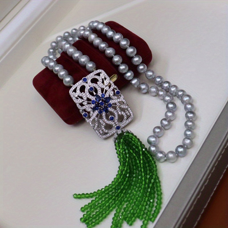 Vintage uslubidagi shirin suv marvaridli sviter bilaguzuk, Chexiya kristall tassellari bilan bezatilgan - har qanday tadbir uchun nafis va ko'p qirrali, sovg'a qutisi bilan birga mukammal sovg'a.