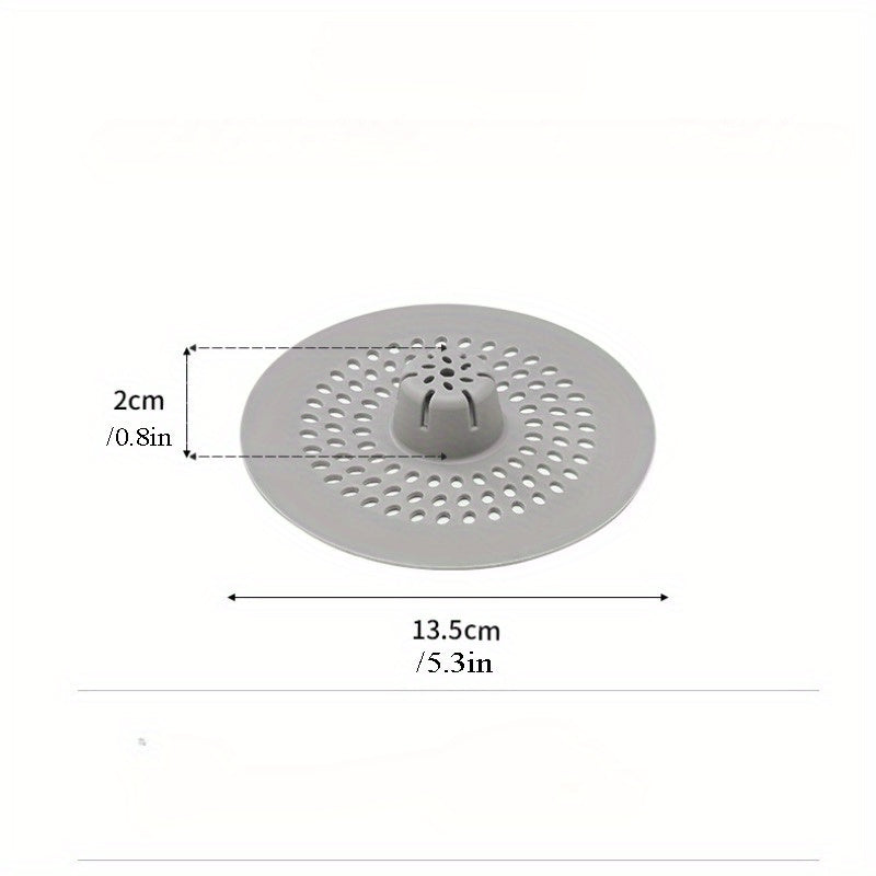 Dumaloq kulrang plastik soch tutgich dush, lavabolar va vannalar uchun. Qoldiqlarni filtrlash va suv oqimini saqlashda samarali. Tozalash oson.