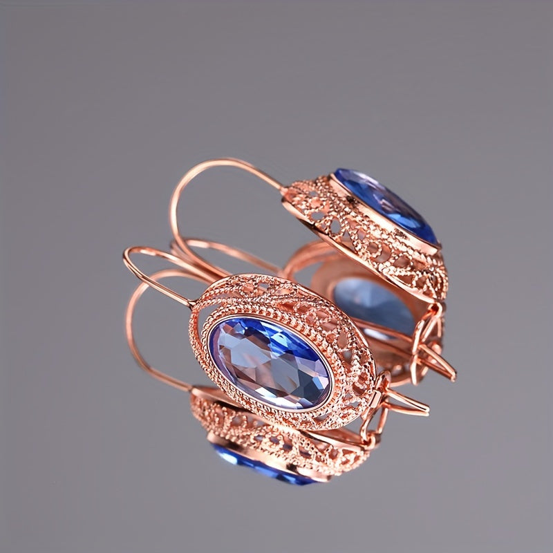 Bir juft vintage uslubidagi rozoviy oltin halqa bilaguzuklar, sintetik garnet bilan, partiyalar va maxsus tadbirlar uchun mukammal. Nikelga ega bo'lmagan misdan tayyorlangan, barcha mavsumlarda kiyish uchun mos.