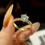 Sevgi kuni sovg'asi: 925 sterling kumushda, 18K oltin qoplamali, sovg'a qutisi bilan mo'jizaviy moissanit to'y uzuk. 6 ta prong bilan jhumka uslubida, tantana va ta'til uchun, ayollar uchun mukammal yozgi to'y uzuki.