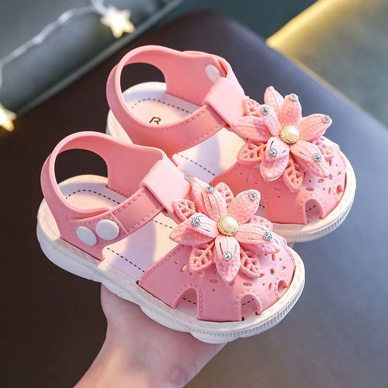 Sandalias de niña pequeña para verano con adornos de flores, zapatos de PVC con corte calado y cierre de hebilla