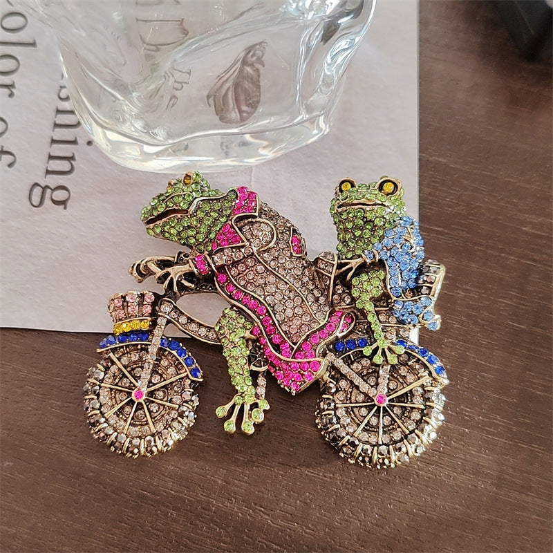 Vintage Rhinestone Frog Brooch Pin with Bike Design Animal Jewelry