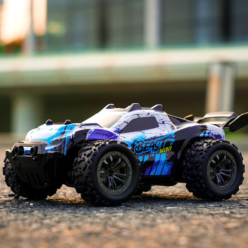 Coche RC todoterreno a escala 1:20 de alta velocidad para niños de 8 años en adelante con control remoto de 2.4G, batería recargable, azul y negro