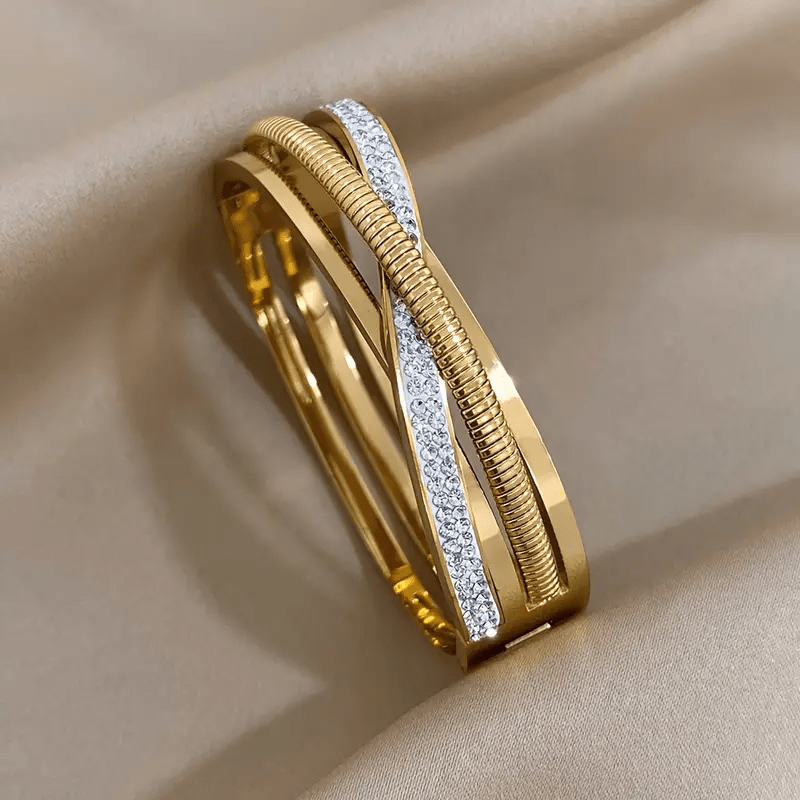 Gold Plated Stainless Steel Triple Strand Bracelet with Cubic Zirconia