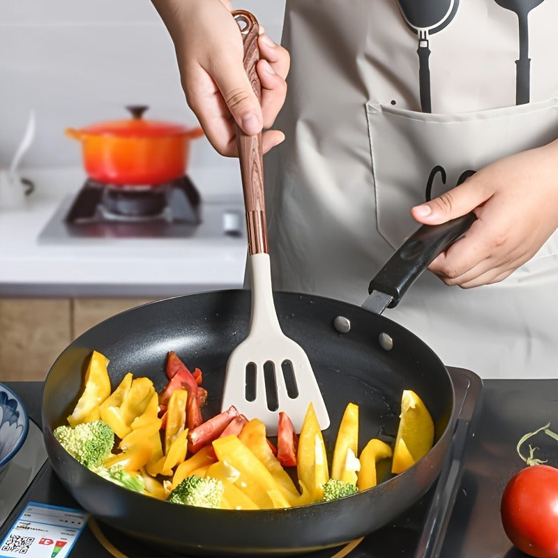 Silicone yog'och to'qimalari spatula, yopishmaydigan qoplama va issiqqa chidamli tutqich bilan, uyda pishirish uchun zarur bo'lgan oshxona asbobi