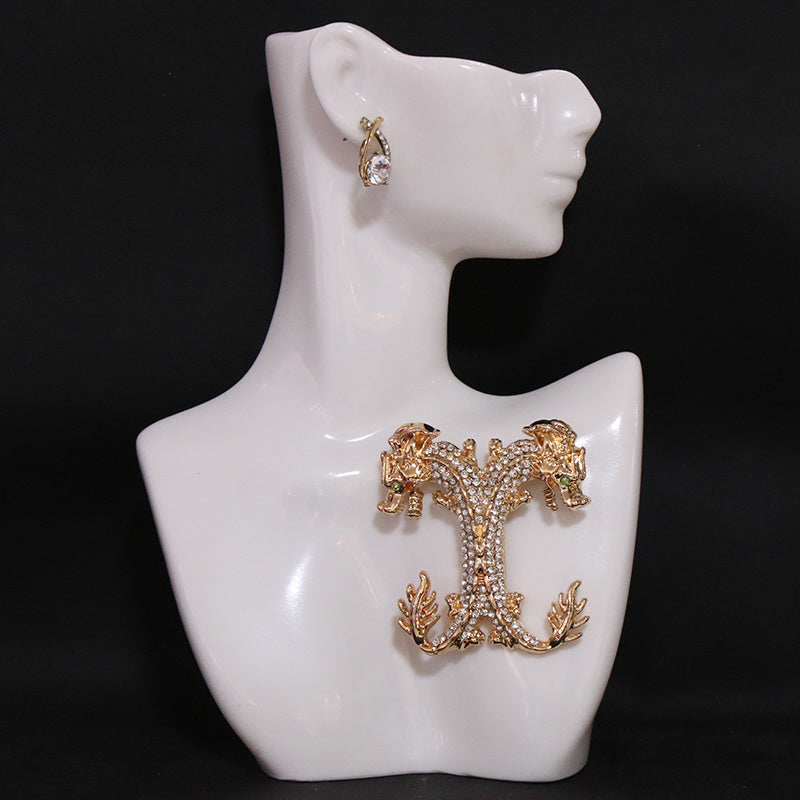 Vintage uslubidagi multfilm ajdaho broshka, rhinestone tafsilotlari bilan - ayollar kiyimlariga, yelkalarga, palto, sviter yoki korsajlarga bir oz g'ayrioddiylik qo'shish uchun mukammal.