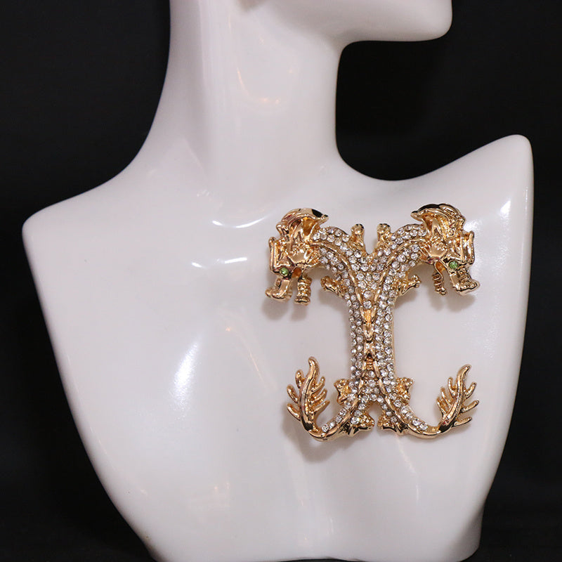 Vintage uslubidagi multfilm ajdaho broshka, rhinestone tafsilotlari bilan - ayollar kiyimlariga, yelkalarga, palto, sviter yoki korsajlarga bir oz g'ayrioddiylik qo'shish uchun mukammal.