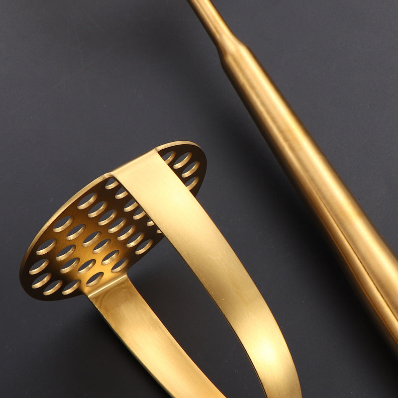 Zanglamaydigan po'latdan yasalgan qo'lda kartoshka maydalagich, sarimsoq bosgich va qovoq maydalagich bilan.