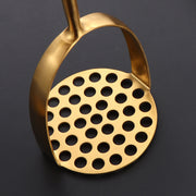 Zanglamaydigan po'latdan yasalgan qo'lda kartoshka maydalagich, sarimsoq bosgich va qovoq maydalagich bilan.