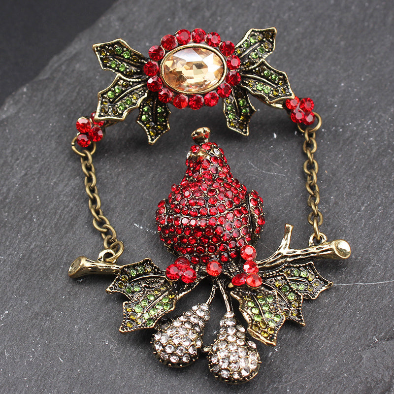 Vintage Rhinestone Parrot Brooch with Holly Accents and Irregular Shape
