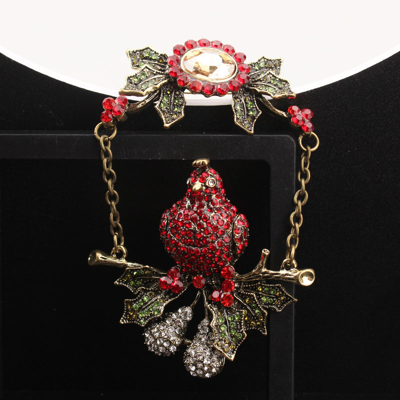 Vintage Rhinestone Parrot Brooch with Holly Accents and Irregular Shape