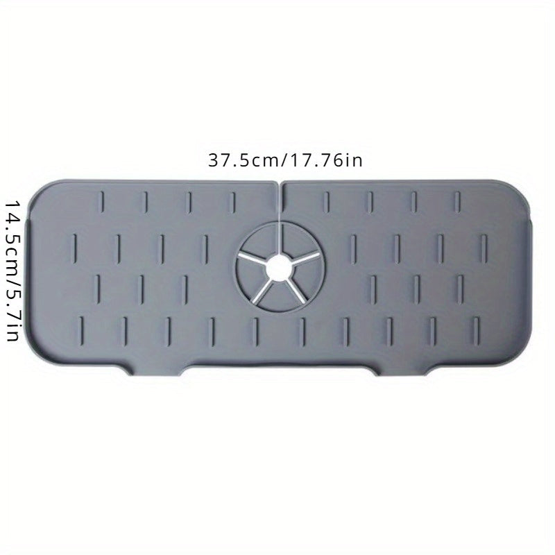 Silicone kran uchun so'ruvchi mat - cho'kmaslikni oldini oladi va suvni oqizadi, oshxona va hammomda ish stollarini himoya qiladi, stol va yuzalarni yumshatadi.