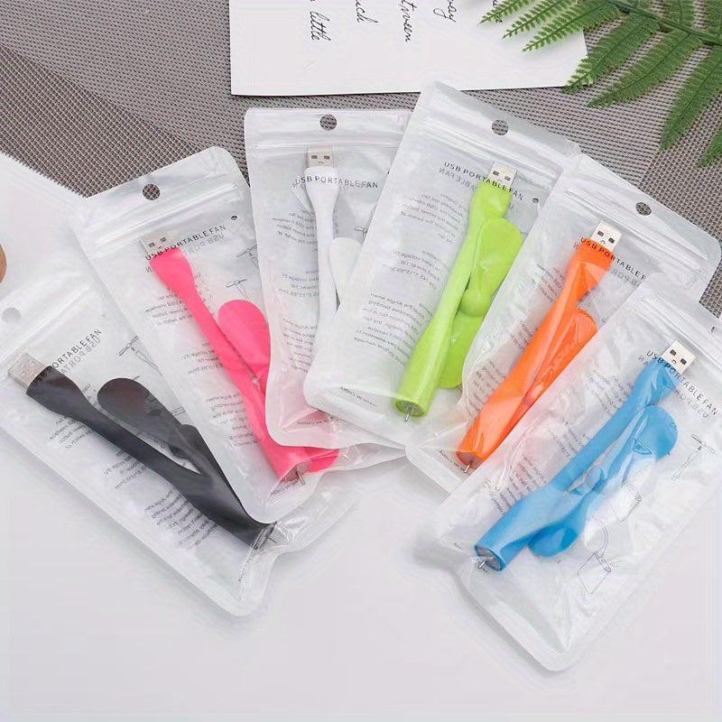 Ko‘p rangli, moslashuvchan dizaynga ega portativ Mini USB ventilyator, quvvat banklari va noutbuklar uchun. Sayohat va ofisda foydalanish uchun ideal, bardoshli plastmassa pichoqchalari bilan.