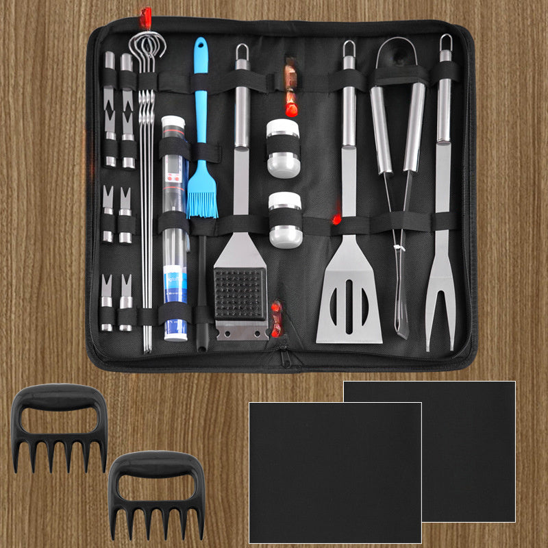25-детальный набор инструментов для гриля из нержавеющей стали для уличных барбекю, включая разнообразные инструменты для приготовления и жарки, изготовленный из металлов пищевого качества.