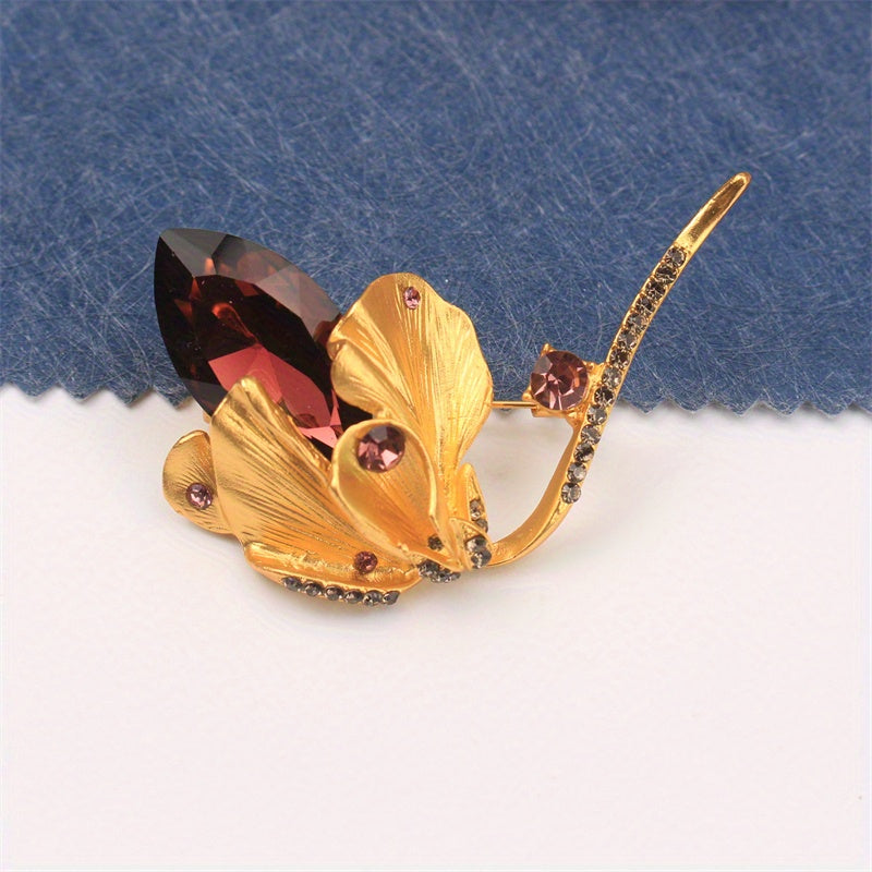 Zarif Rhinestone Gul Brosh: Yorqin rhinestone'lar bilan bezatilgan ajoyib aksessuar, ayollarning kiyim palto, sviterlarini bezash uchun yoki zamonaviy yelka pin korsaji sifatida mukammal.