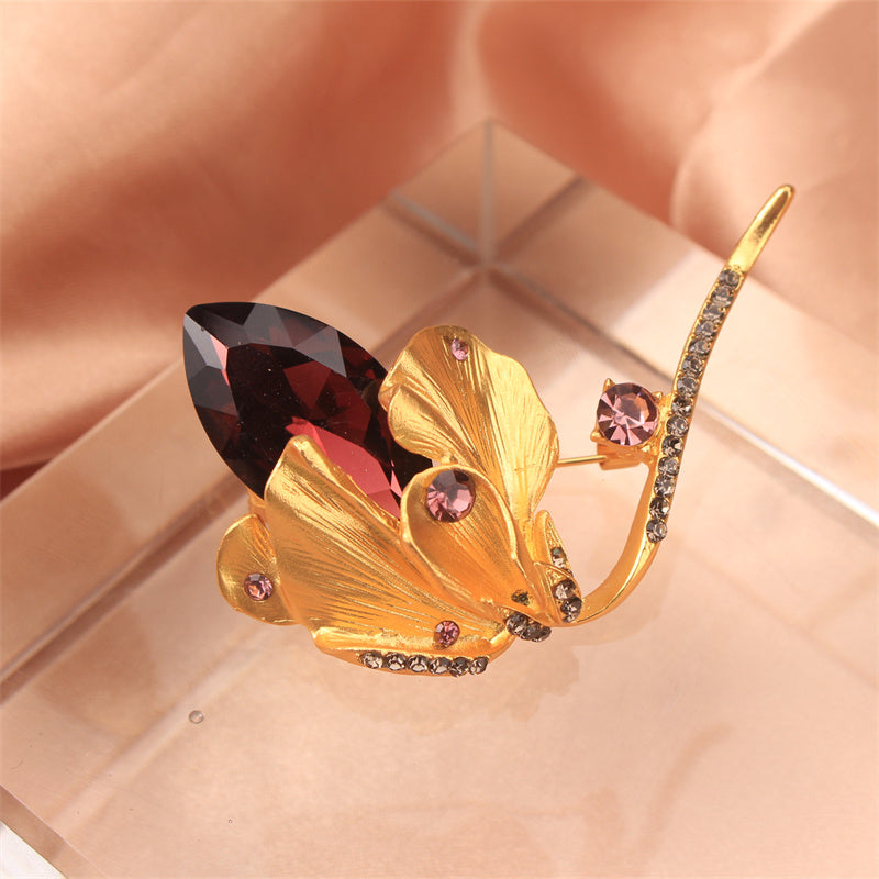 Zarif Rhinestone Gul Brosh: Yorqin rhinestone'lar bilan bezatilgan ajoyib aksessuar, ayollarning kiyim palto, sviterlarini bezash uchun yoki zamonaviy yelka pin korsaji sifatida mukammal.