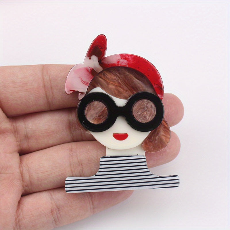 Ushbu Vintage Akril Multfilm Ko'zoynak Qiz Brosh Pin bilan retro uslubni oling! Ushbu ijodiy moda aksessuari notekis shaklga va noyob shaxsiyatga ega bo'lib, kiyimlaringiz va sumkalaringizga rang-baranglik qo'shish uchun mukammal belgi hisoblanadi.
