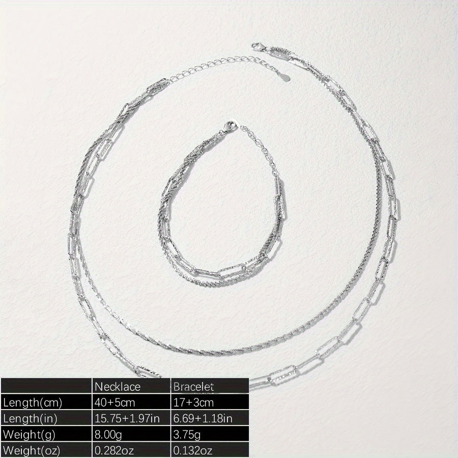 Стильный дуэт: набор ожерелья и браслета из серебра 925 пробы - с шикарным дизайном цепочки в виде скрепки, идеально подходит для повседневной носки или особых случаев.