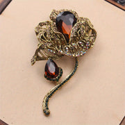 Broche antiguo de mujer con loto y grandes rhinestones de flor retro