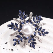 Snowflake Brooch with Rhinestone Petals and Pearl Center for Elegant Outfits