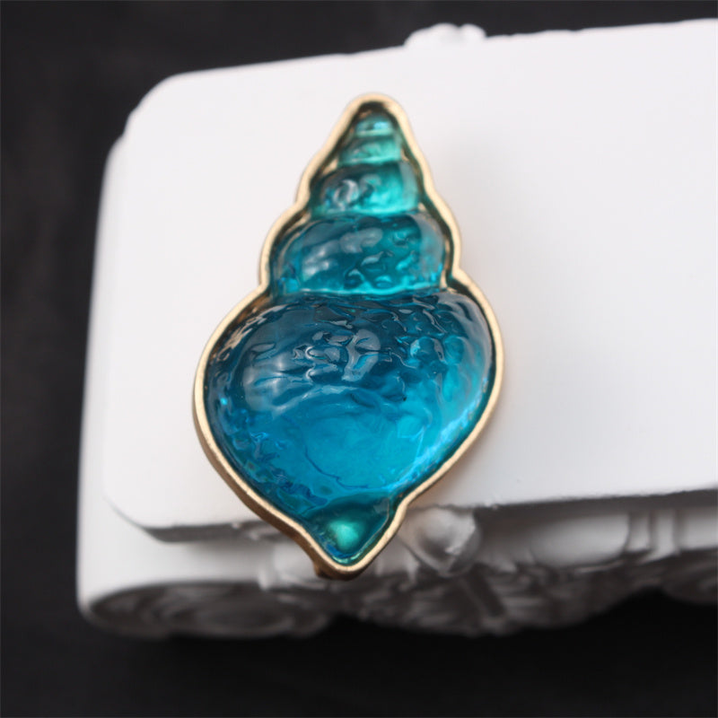 Broche de caracol marino de esmalte azul para mujer, diseño floral irregular, otoño e invierno