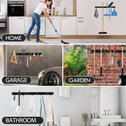 Soporte para escoba y fregona negro de montaje en pared con ganchos de madera para garaje, lavandería y armario