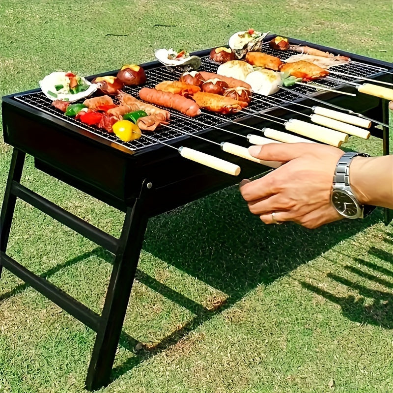 Sayohat, piknik va lager uchun mukammal bo'lgan portativ yig'iladigan zanglamaydigan po'latdan yasalgan ko'mir grill, kichik, engil va batareyasiz.