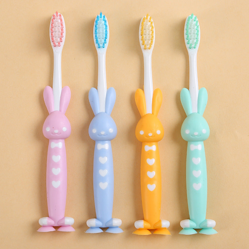Set of Four Soft Bristle Bamboo Charcoal Toothbrushes with Cute Rabbit and Bear Designs in Pastel Colors