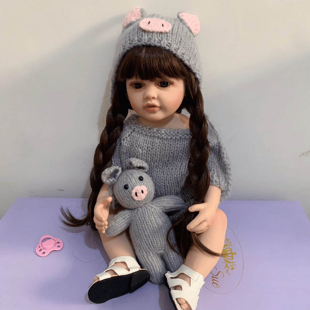 22 Inch Vinyl Reborn Girl Doll with Long Hair and Plush Toy for Ages 3+
