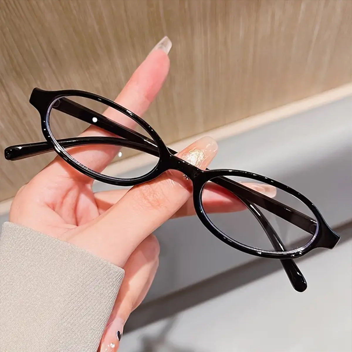 Gafas ovaladas para mujer con lentes anti-luz azul y montura de plástico