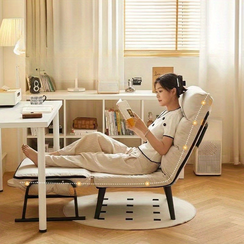 Бежевое кожаное складное кресло-реклайнер с железной рамой, подушкой и многофункциональным дизайном для офиса или сна.