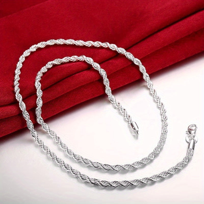 925 Silver Plated Jewelry Set, zamonaviy Hip Hop Boho uslubidagi marjon va bilaguzuk kombinatsiyasi, burama ip dizayni bilan. Ayollar uchun kundalik kiyim yoki sovg'a sifatida mukammal, Rojdestvo mavsumi uchun ideal. Ushbu marjon to'plami taklif etadi