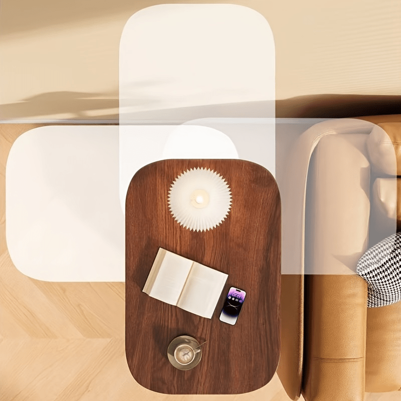 Универсальный приставной столик с регулируемой высотой. Изготовлен из прочной ДВП и недревесных материалов для удобства переноски и экономии места в гостиных, спальнях и офисах. Не требует подключения к электричеству.