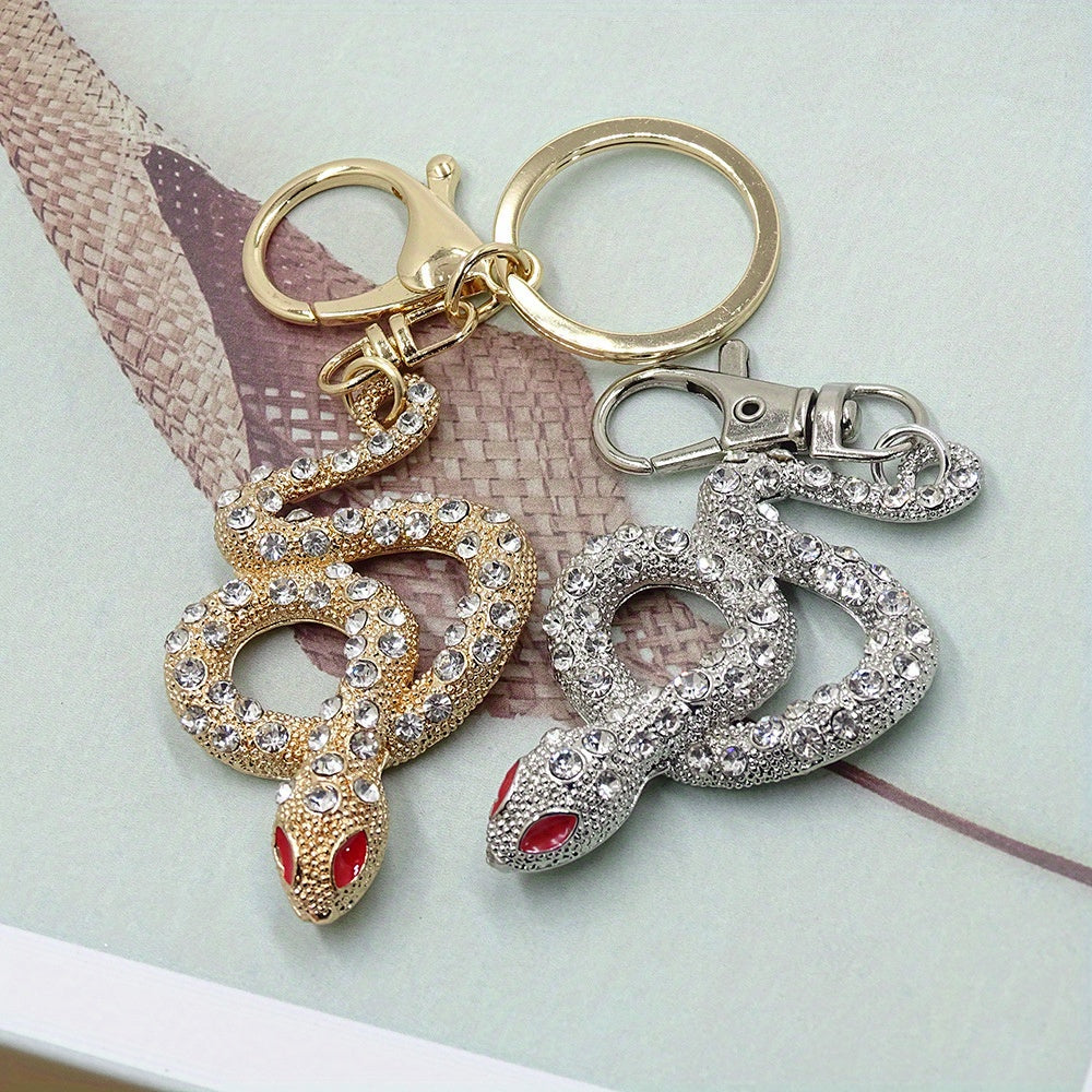 Llavero de aleación con diseño de serpiente en oro y plata para mujeres, accesorios decorativos