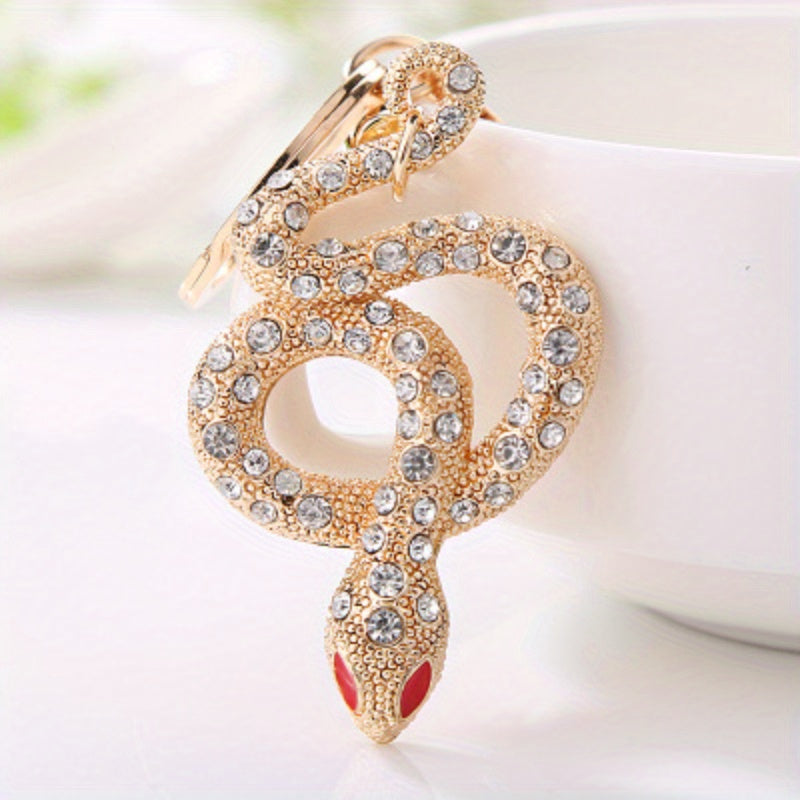 Llavero de aleación con diseño de serpiente en oro y plata para mujeres, accesorios decorativos