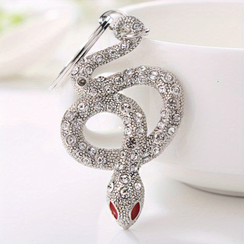 Llavero de aleación con diseño de serpiente en oro y plata para mujeres, accesorios decorativos