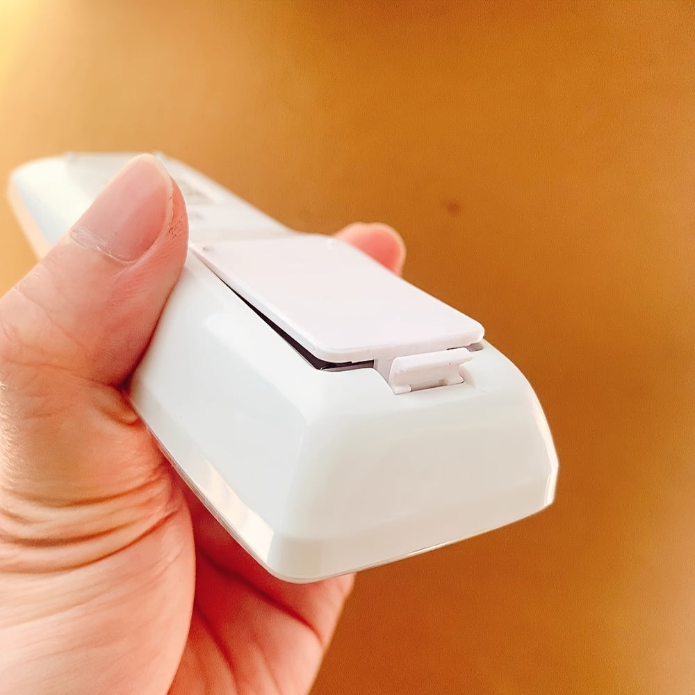 Havo konditsioneri masofadan boshqarish pultining orqa qopqog'i batareya qopqog'i bilan qalinroq.