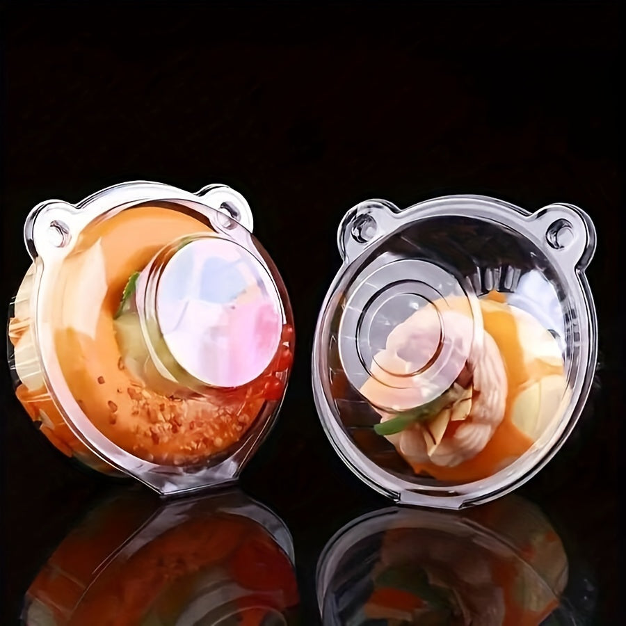 Одноразовые упаковочные коробки для десертов в форме головы кошки доступны в упаковках по 25, 50 или 100 штук. Идеально подходят для вечеринок и собраний, эти пластиковые упаковочные коробки для выпечки идеально подходят для хранения маффинов и тортов.