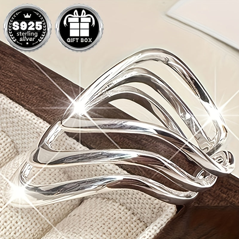 Ayollar uchun nozik sozlanadigan keng halqa - 925 sterling kumushdan tayyorlangan, zamonaviy ko'p qatlamli dizayni bilan, sovg'a qutisida keladi - partiyalar va har kuni kiyish uchun ajoyib, mukammal sovg'a bo'ladi.