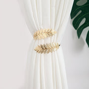 Decorative Curtain Tieback with Gold Accents and Leaf-Shaped Hooks