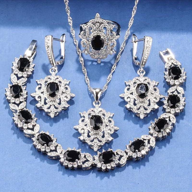 5 dona 18K oltin qoplamali misdan iborat hashamatli va nafis zargarlik to'plami, sun'iy marvarid va kubik zirkon bilan bezatilgan. To'plamga sirg'alar, marjon, pendant, uzuk va bilaguzuk kiradi, kundalik kiyim va maxsus tadbirlar uchun mukammal. Ajoyib