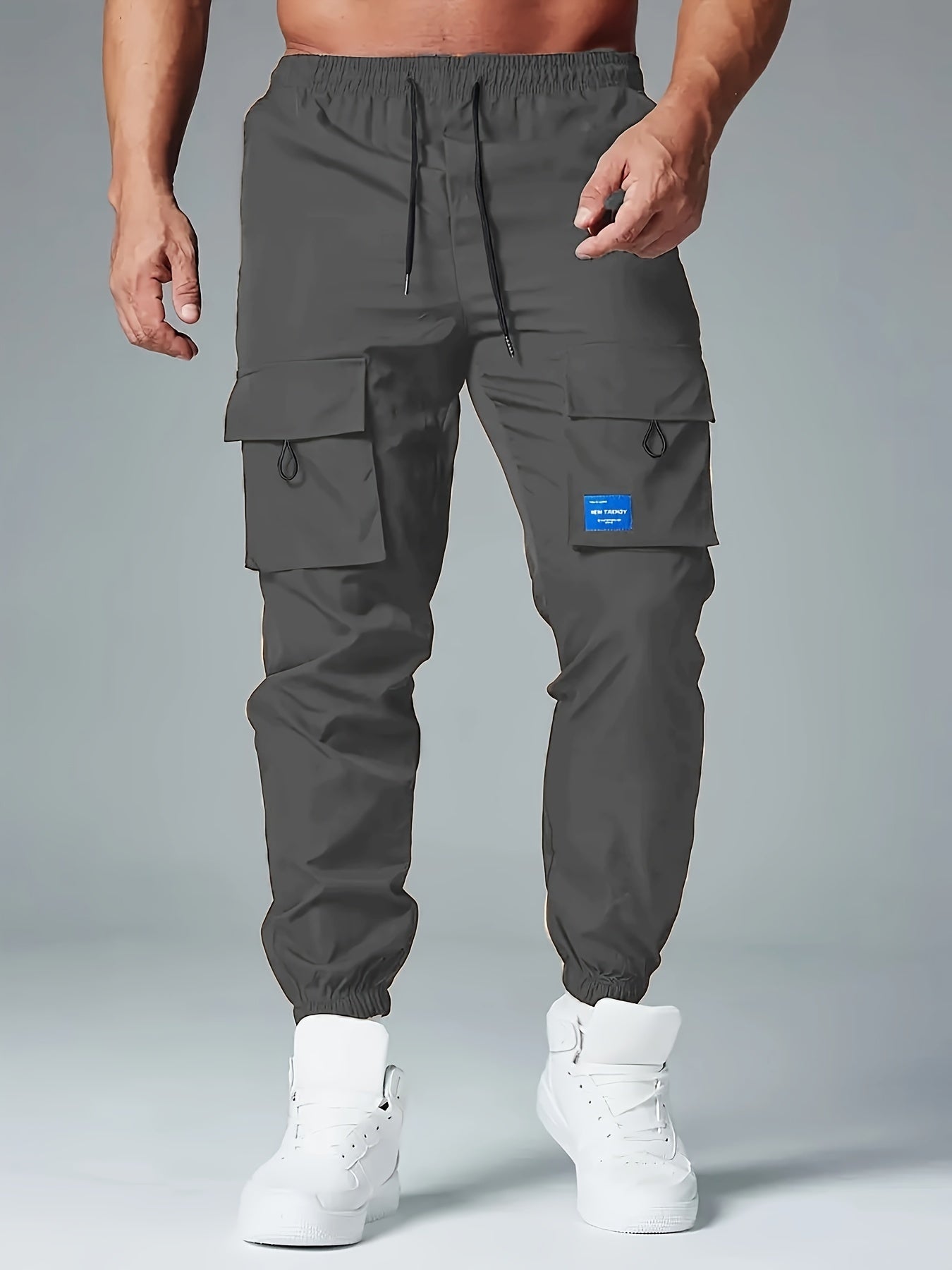 Men's Polyester Cargo Pants with Drawstring Waist and Multiple Pockets for Spring and Fall