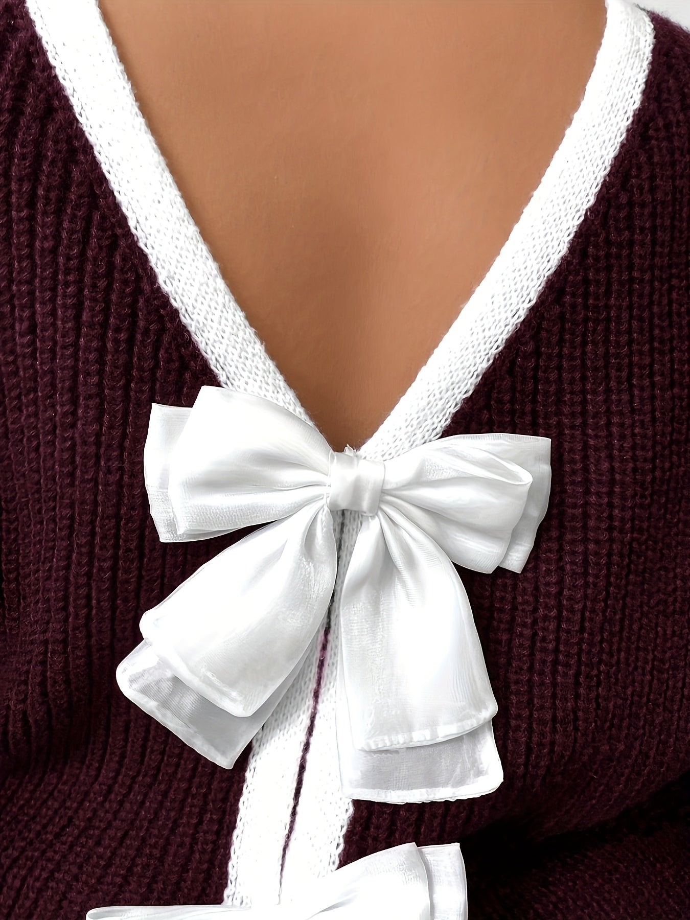 Suéter verde de talla grande para mujer con lazo blanco de manga larga y cuello redondo