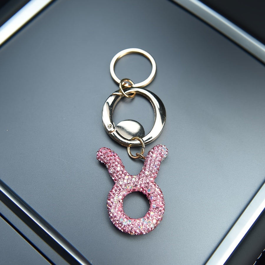 Llavero de resina rosa y metal con cristales para bolsos y mochilas