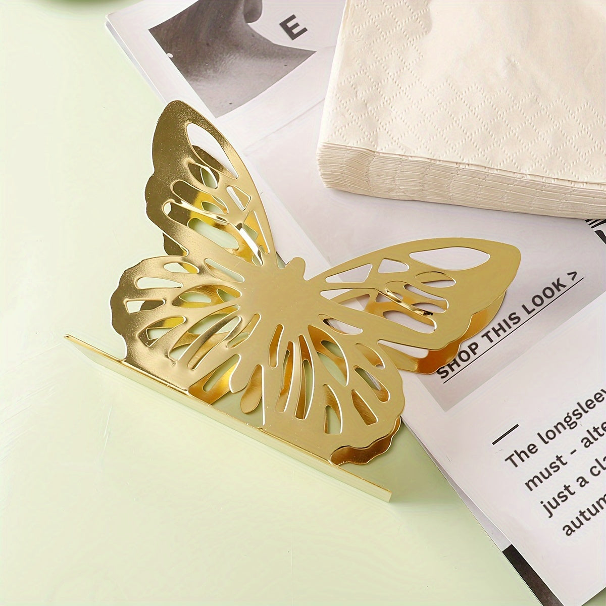 Oyoq shaklidagi metall tishli qog'ozni chiqarish uchun idish oshxona stoli yoki ovqatlanish stoliga