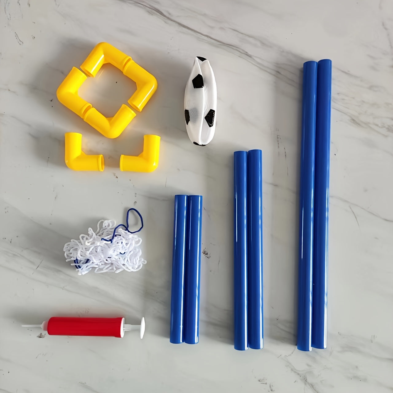 Ichki mikro to'p futboli maqsadi to'plami, pompasi va qog'oz qadoqlashdagi plastik to'p bilan. To'p tarmog'i kiritilgan, o'lchami 60 sm x 40 sm. Oson yig'iladi, park yoki plyajga olib borish uchun qulay.