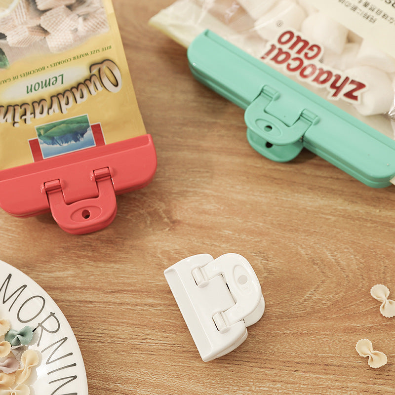 Clips de sellado de comida de plástico, múltiples tamaños y colores para almacenamiento hermético