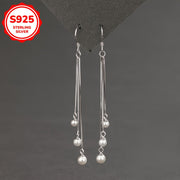 Silliq va zamonaviy, bu S925 Sterling Silver sirg'alar uzun tassellarga va shirin suv marvaridlariga ega. Gippoallergen va 2G og'irlikda yengil, ular ayollar uchun har kuni kiyish uchun ideal va ajoyib Onalar kuni sovg'asi bo'ladi.